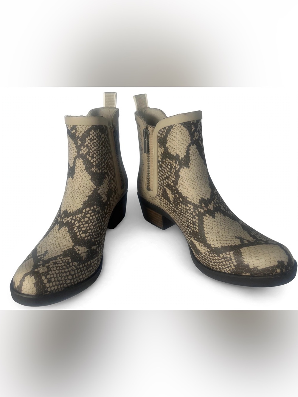 These are the Lucky Brand Basel H2O Rain Boot in a chic chinchilla snake prin